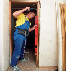 Installation of veneered doors.